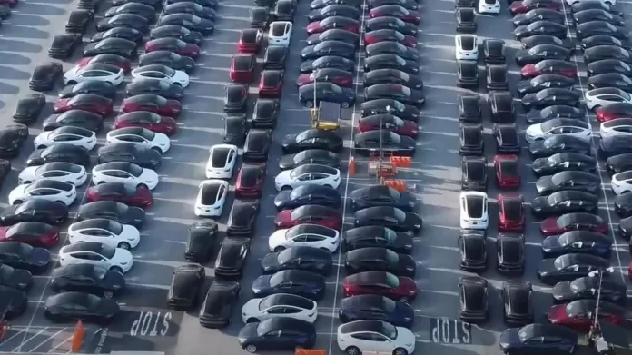 WATCH: Tesla Is Storing Unsold Cars In Abandoned Parking Lots